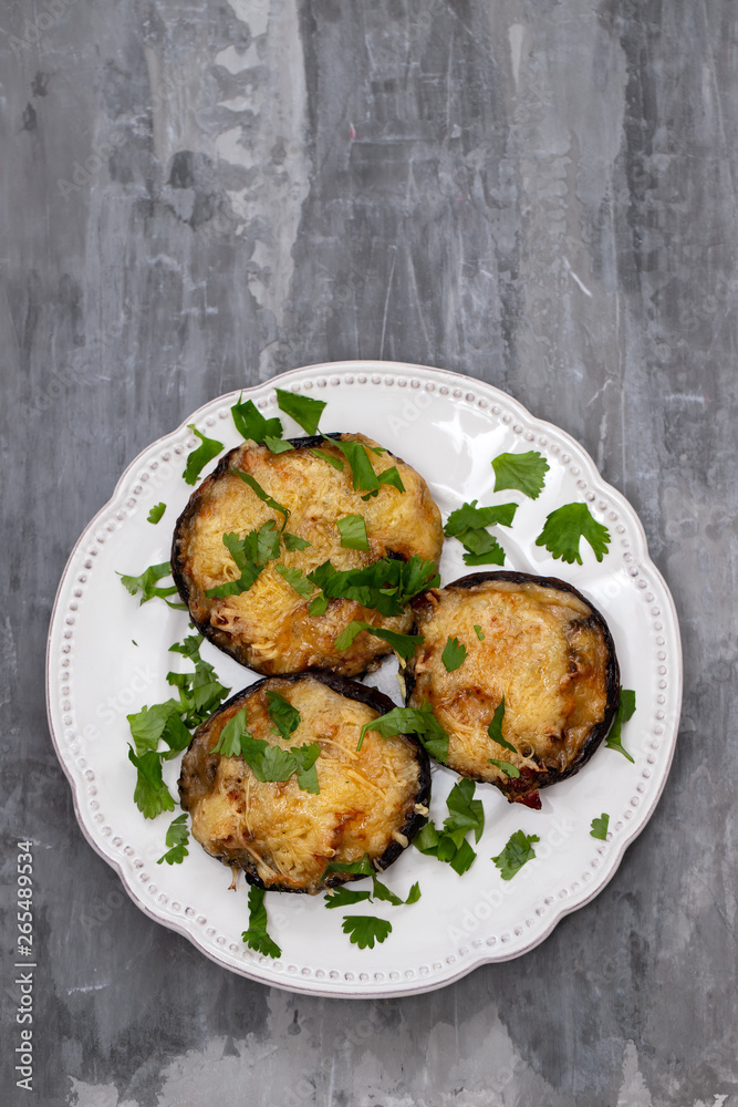 stuffed mushrooms with cheese and herbs on white beautiful dish stuffed mushrooms with cheese and herbs on white beautiful dish