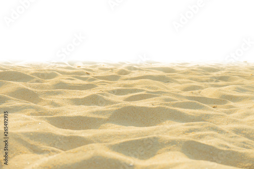 Fine beach sand texture in the summer sun on white