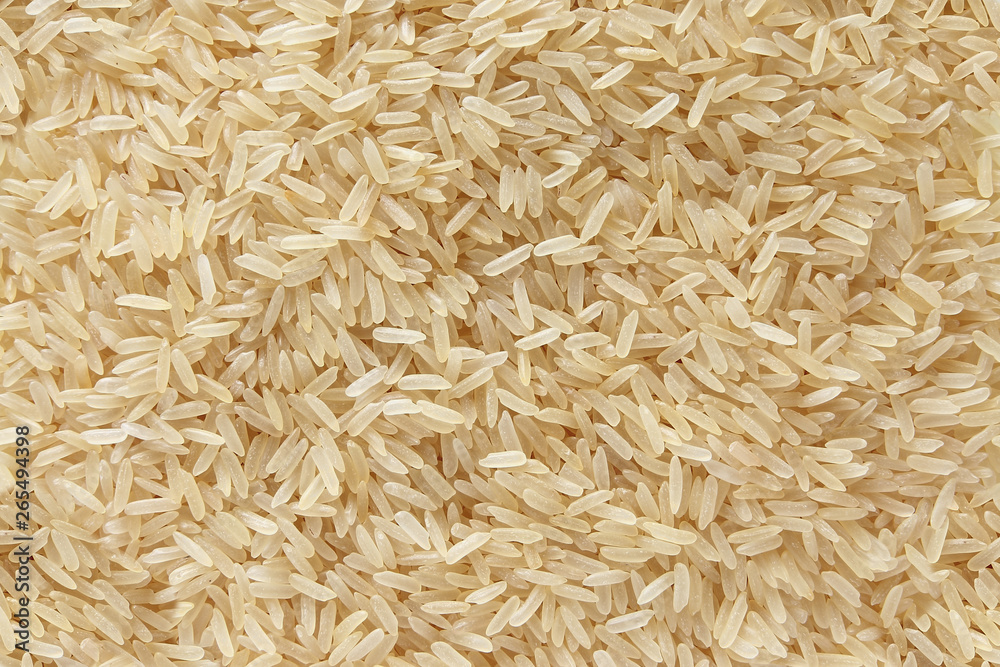 Rice fragrant basmati scattered top view raw background