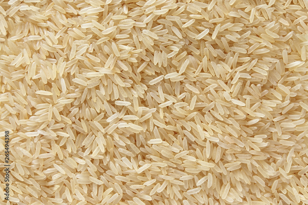 Rice fragrant basmati scattered top view raw background Rice fragrant basmati scattered top view raw background