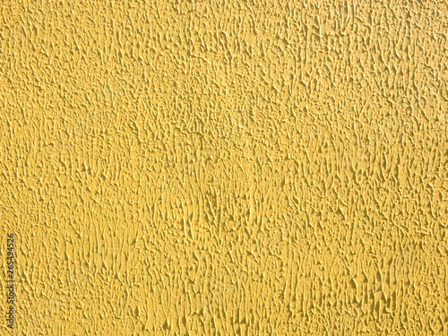 Yellow cement wall. Abstract grunge texture background. Copy space, empty template for text