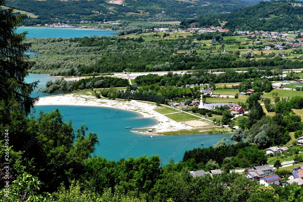 Aerial view of small italian village Farra D'Alpago in alps near Santa Croce lake.