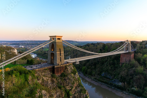 View across Bristol as the sun sets on Isambard Kingdom Brunels Suspension Bridge in Clifton , Bristol (UK)