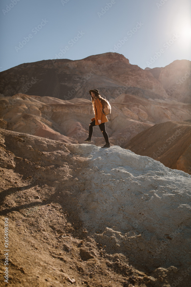 woman hiking in death valley desert