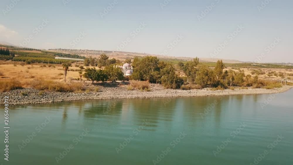 Orthodox Church of the 12 apostles. Sea of Galilee. Capernaum. Aerial dolly Orthodox Church of the 12 apostles. Sea of Galilee. Capernaum. Aerial dolly