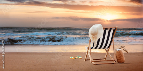 Fototapeta Beach chair with hat on tropic beach