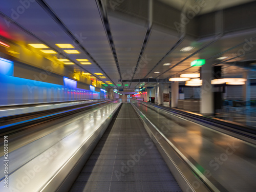 Long Exposure moving walkway with neon light at underground
