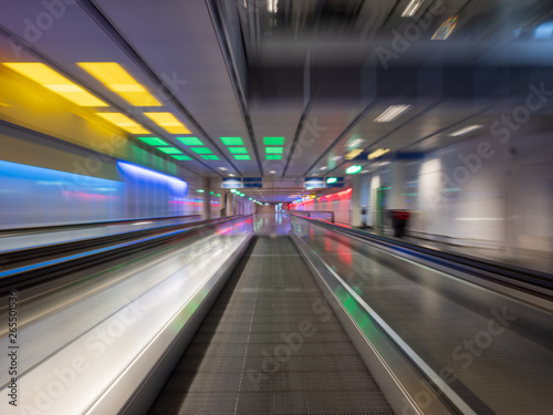 Long Exposure moving walkway with neon light at underground © Wolfgang Hauke