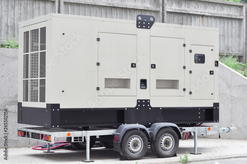 Industrial generator power. Mobile diesel backup generator on caravan wheels.  Backup power supply generator for emergency.