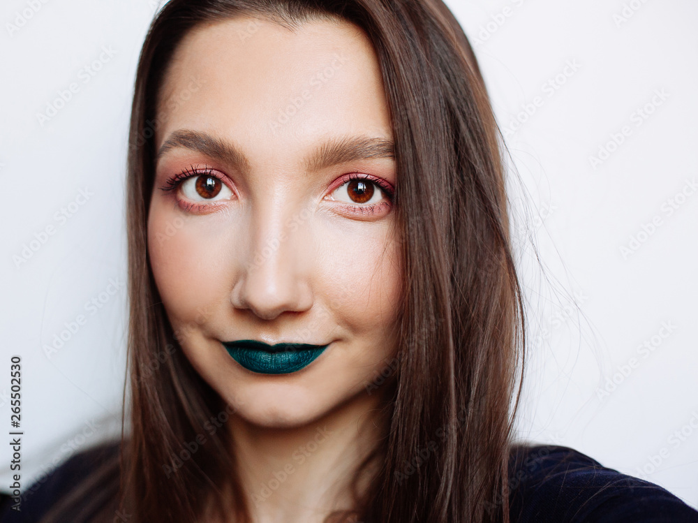 Close up selfie portrait of pretty young woman with creative make up Close up selfie portrait of pretty young woman with creative make up