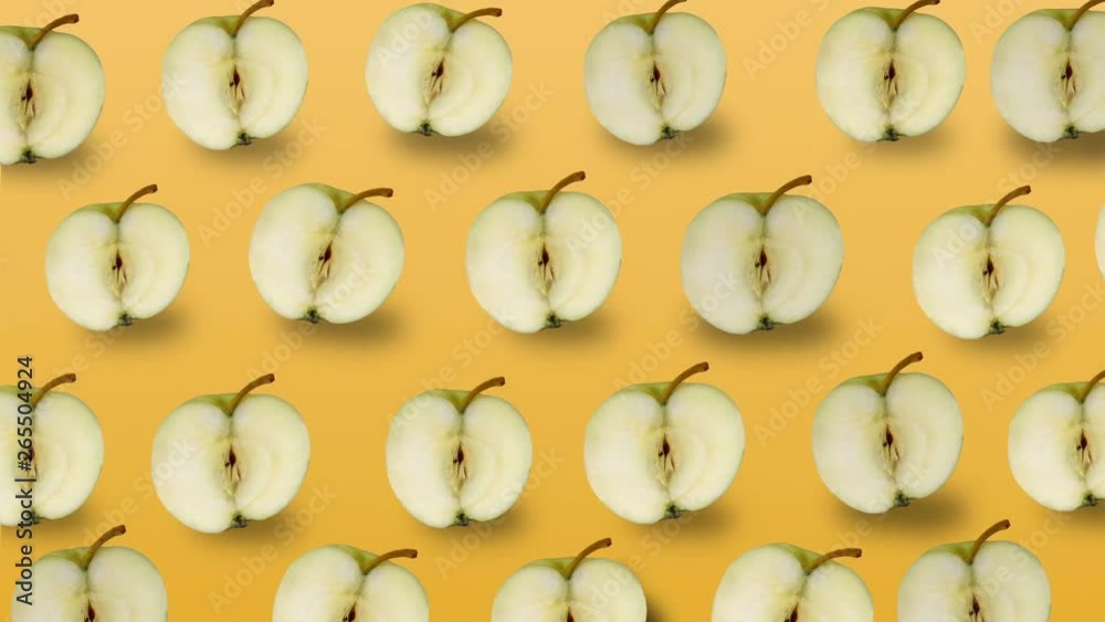 Colorful fruit pattern of fresh yellow apples on yellow background. 4k video. Colorful fruit pattern of fresh yellow apples on yellow background. 4k video.