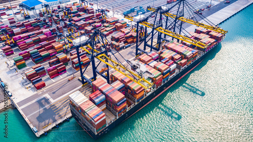 Cargo ship, loading and unloading goods at the deep sea port