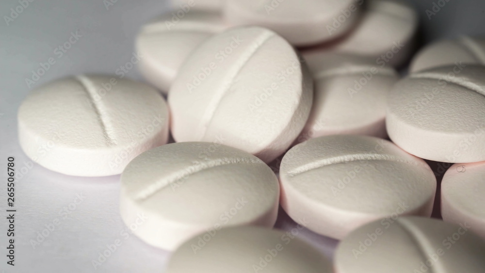 22368_White_capsules_on_a_macro_shot_on_the_table.jpg 22368_White_capsules_on_a_macro_shot_on_the_table.jpg