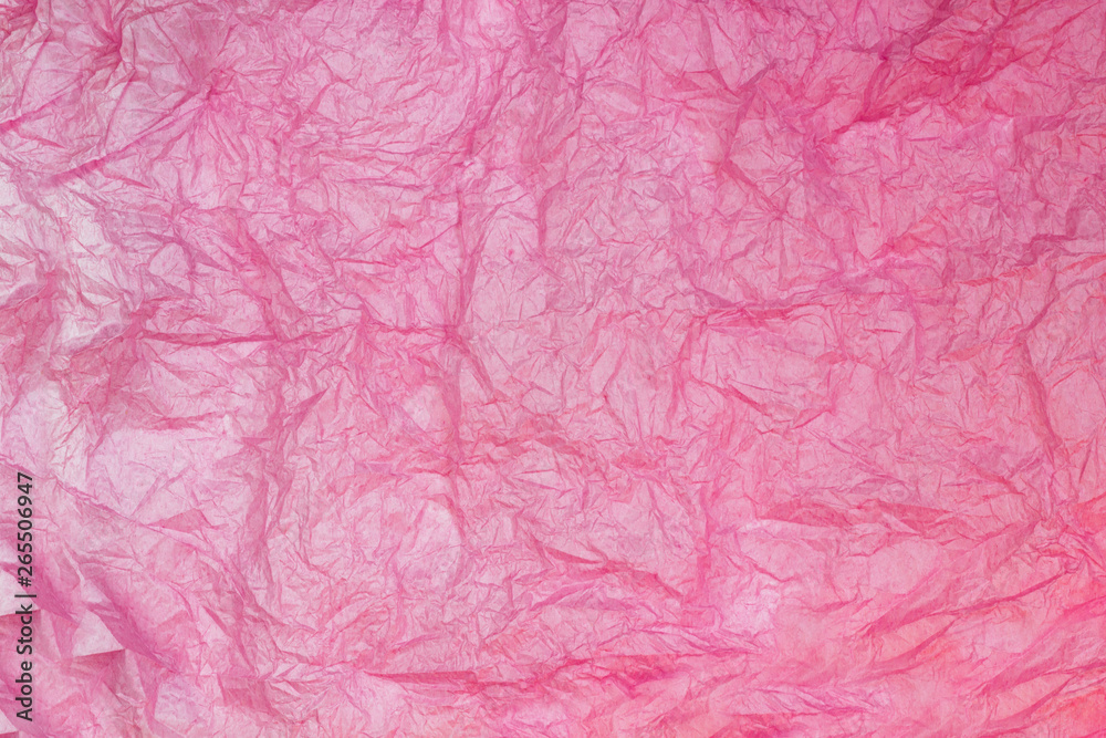 Pink wrinkled paper texture background. Crumpled sheet of paper Pink wrinkled paper texture background. Crumpled sheet of paper