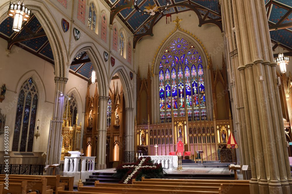 Renovated altar sanctuary with stained glass window St Michael's Cathedral Basilica Toronto