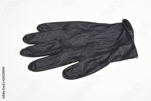 Black Nitrite Glove,isolated on white with clipping path © Amporn