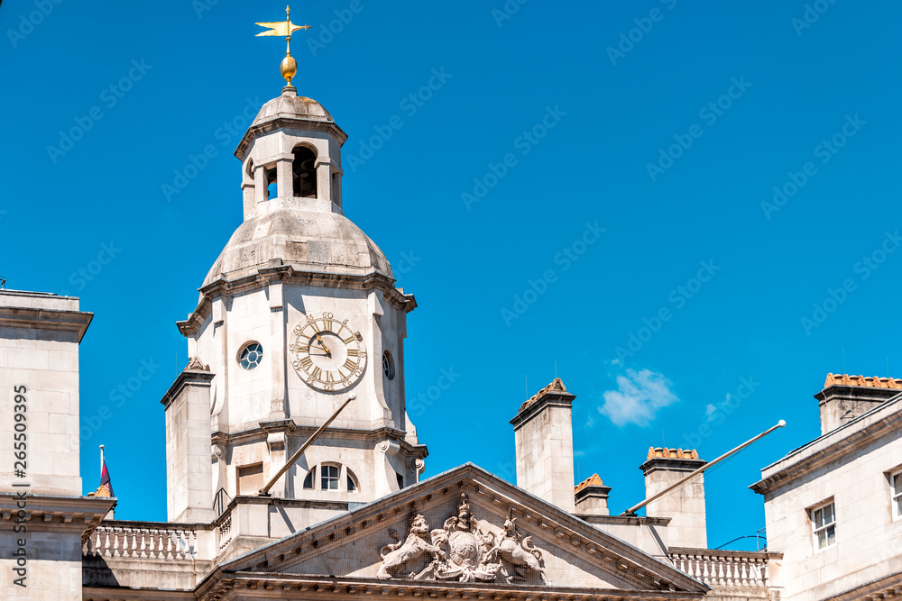 London, UK Horse Guards Parade Whitehall building in the city of Westminster architecture closeup of clock tower blue sky