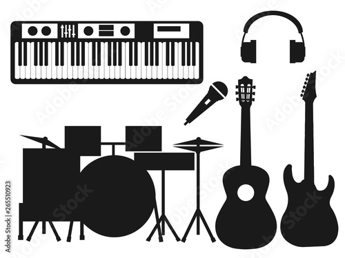 Collection of black silhouettes of musical instruments on a white background