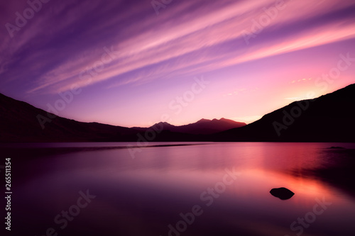 Wallpaper Mural The lake Llynnau Mymbyr reflecting the sky, clouds and sunset with Mount Snowdon in the background