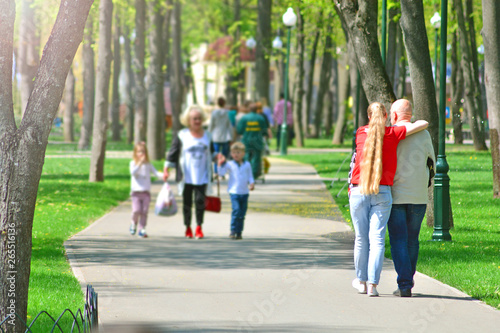 Walking together along the park alley.