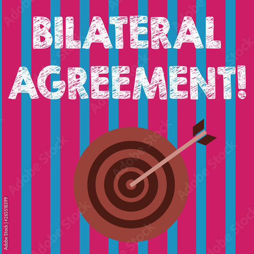 Word writing text Bilateral Agreement. Business photo showcasing Legal obligations to nonbinding agreements of principle Color Dart Board in Concentric Style with Arrow Hitting the Center Bulls Eye photo