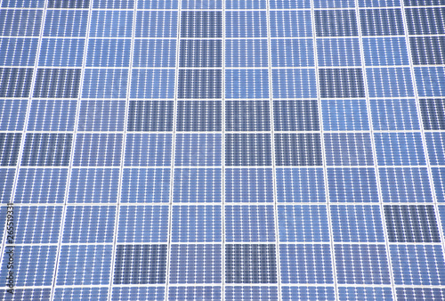 Wallpaper Mural background of photovoltaic solar panels,  natural energy source, symetric blue background Torontodigital.ca