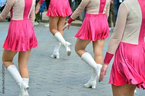 Cheerleaders closeup in a symmetrical formation 