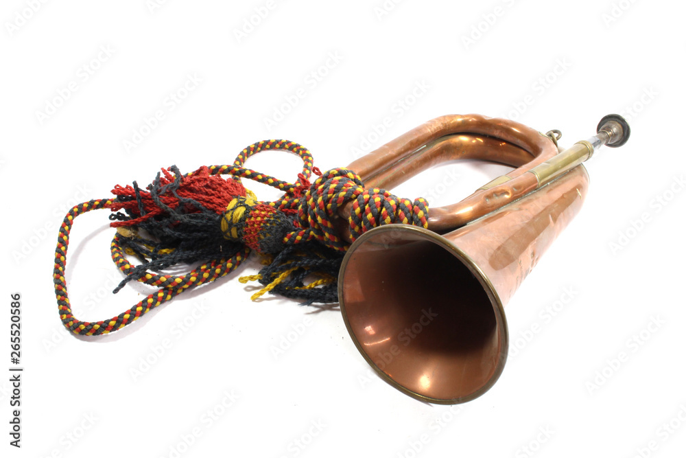 A Brass and Copper Small Bugle Instrument On White Background A Brass and Copper Small Bugle Instrument On White Background