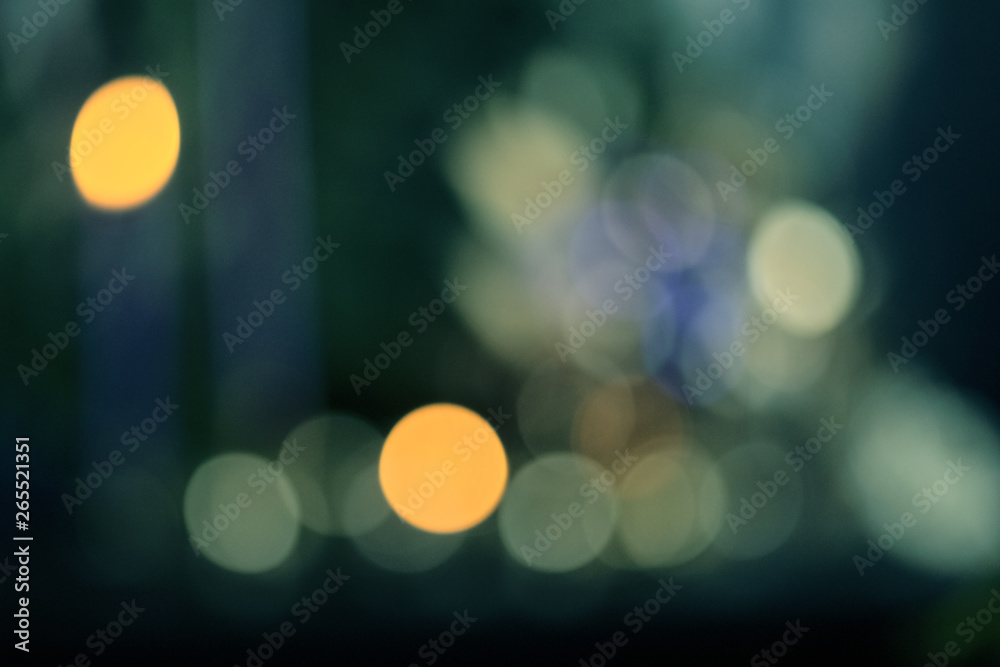 Abstract blue green bokeh background with soft focus christmas lights