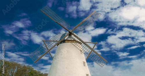 3257_The_old_windmill_with_four_blades_in_the_farm-2.jpg photo