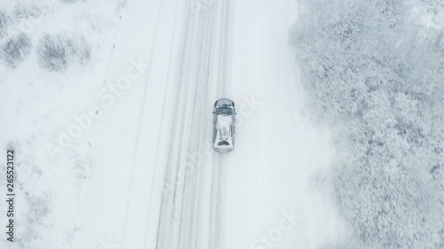 22069_Aerial_view_of_the_black_car_running_on_the_road_.jpg © Nordicstocks