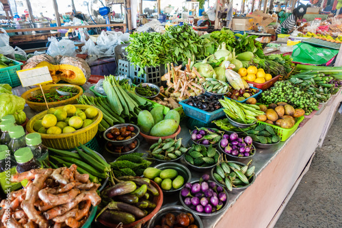 Traditional asian market. Fruits and vegetables at a farmers market. Organic fresh agricultural product. © Sloniki