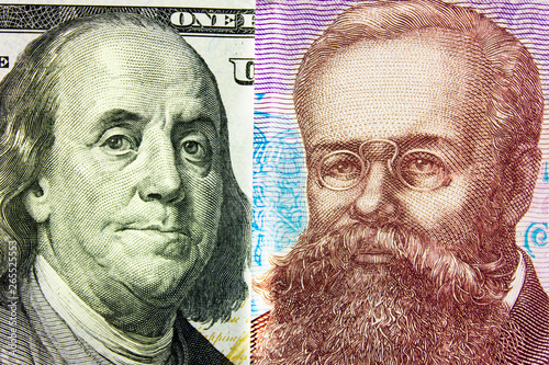 Banknotes US dollars and Ukrainian hryvnia,  portrait of Franklin against  portrait of Grushevsky, concept of  hryvnia exchange rate, Internet trading. photo