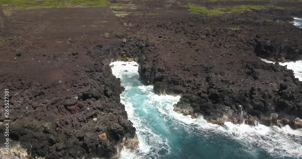 Aerial/Drone - Waves Crashing on Lava Rocks Aerial/Drone - Waves Crashing on Lava Rocks