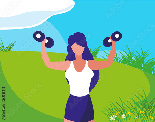 athletic woman weight lifting in the camp
