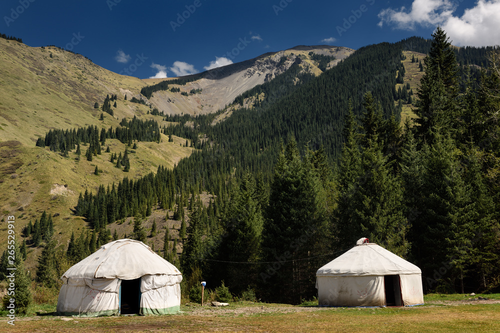 Yurt tents at campground of Kaindy Lake in the Kungey Alatau mountains of Kazakhstan