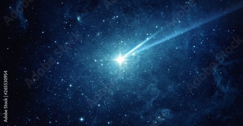 Falling meteorite, asteroid, comet in the starry sky. Elements of this image furnished by NASA.