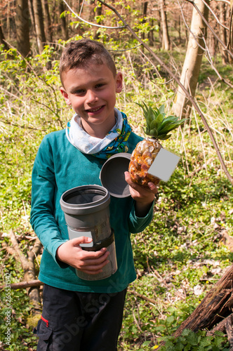 Boy found a well hidden cache in a tube with pineapple