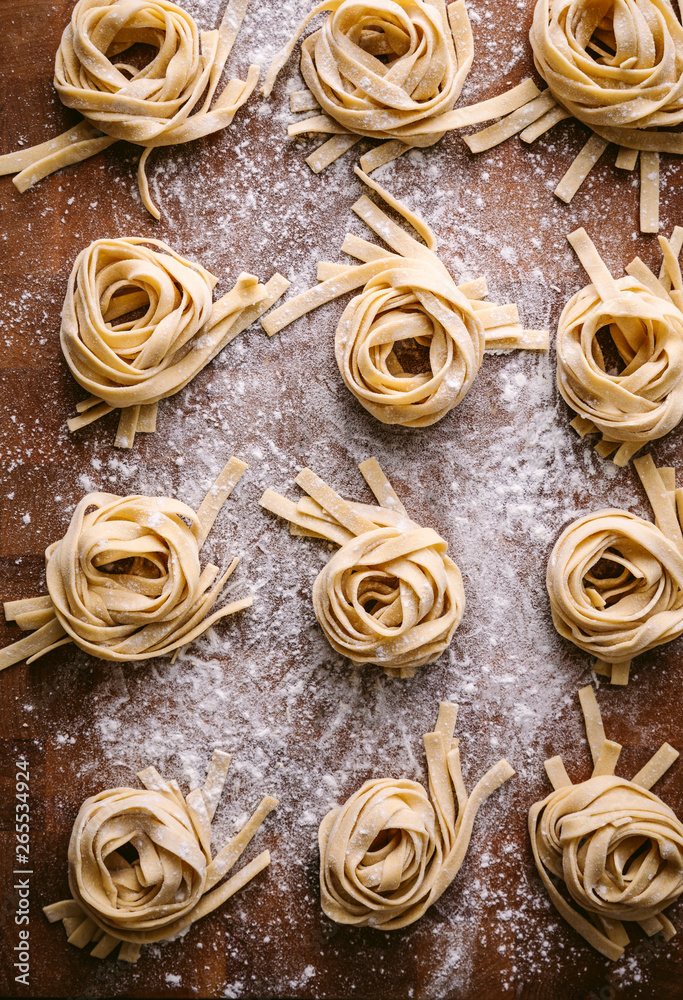 Overhead shot of fettuccine bundles Overhead shot of fettuccine bundles