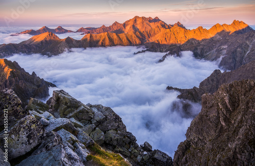 Mountains Landscape with Inversion in the Valley at Sunset as seen From Rysy Peak in High Tatras, Slovakia photo