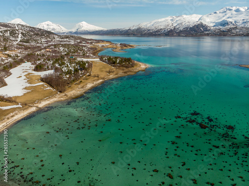 Turquoise Fjord  in Lofoten, Norway © Keerathi