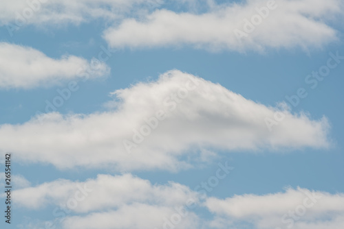 Beautiful white puffy clouds with pretty blue sky - nature background