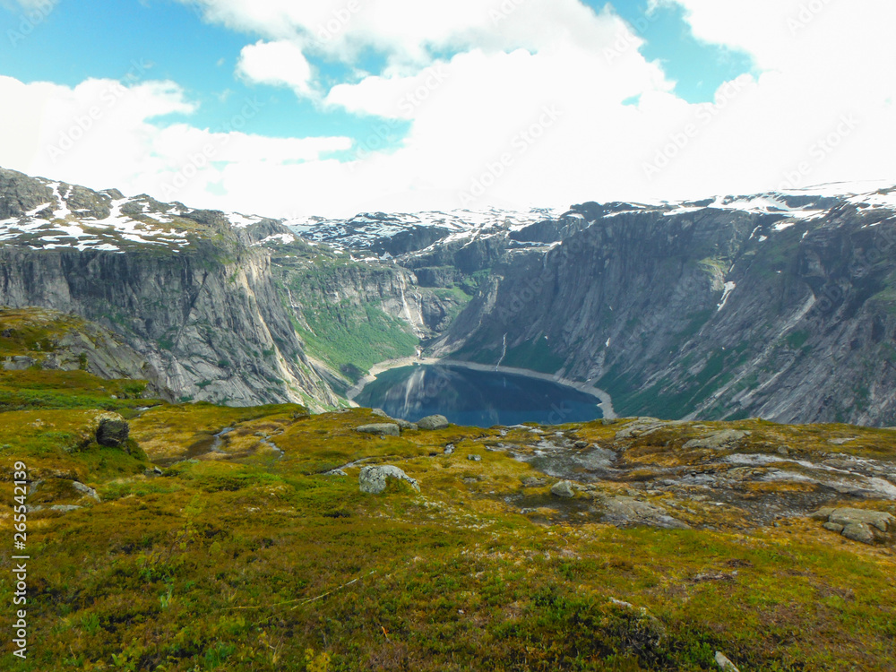 Trolltunga hike, Lake Ringedalsvatnet, Norway, Beautiful scandinavian landscape, Scandianavia, summer nature. Hike starts from Odda town
