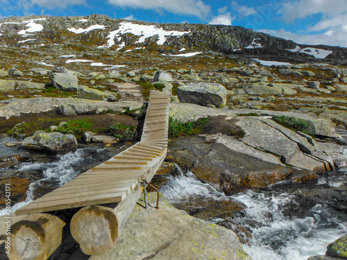 Trolltunga hike, Lake Ringedalsvatnet, Norway, Beautiful scandinavian landscape, Scandianavia, summer nature. Hike starts from Odda town photo