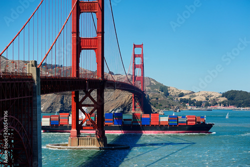 Barge passing under Golden Gate Bridge, San Francisco, California, United States photo