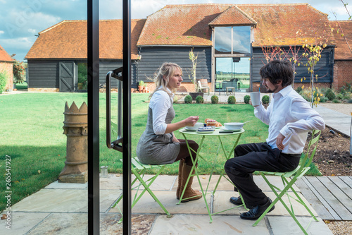 Wallpaper Mural Caucasian couple eating lunch in backyard Torontodigital.ca
