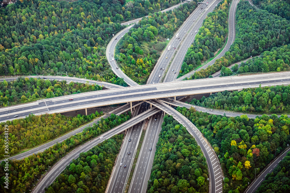 Aerial view of intersecting highways near trees, London, England Aerial view of intersecting highways near trees, London, England