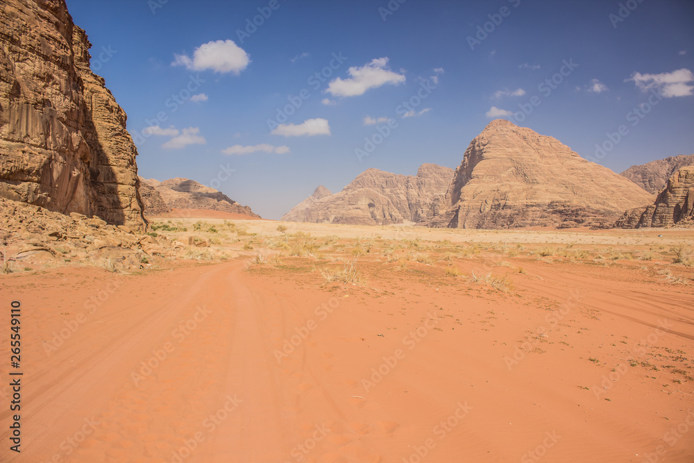 Wadi Rum desert scenery landscape valley and mountain in sand dunes environment, sightseeing tour Middle East famous heritage place for tourists 
