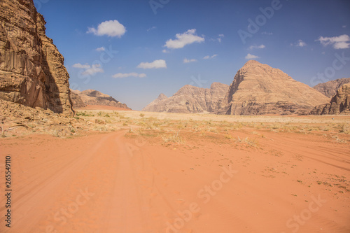 Wadi Rum desert scenery landscape valley and mountain in sand dunes environment  sightseeing tour Middle East famous heritage place for tourists 