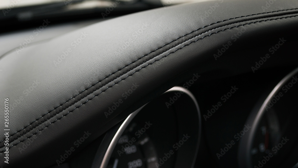 Leather background. Modern business car leather dashboard.